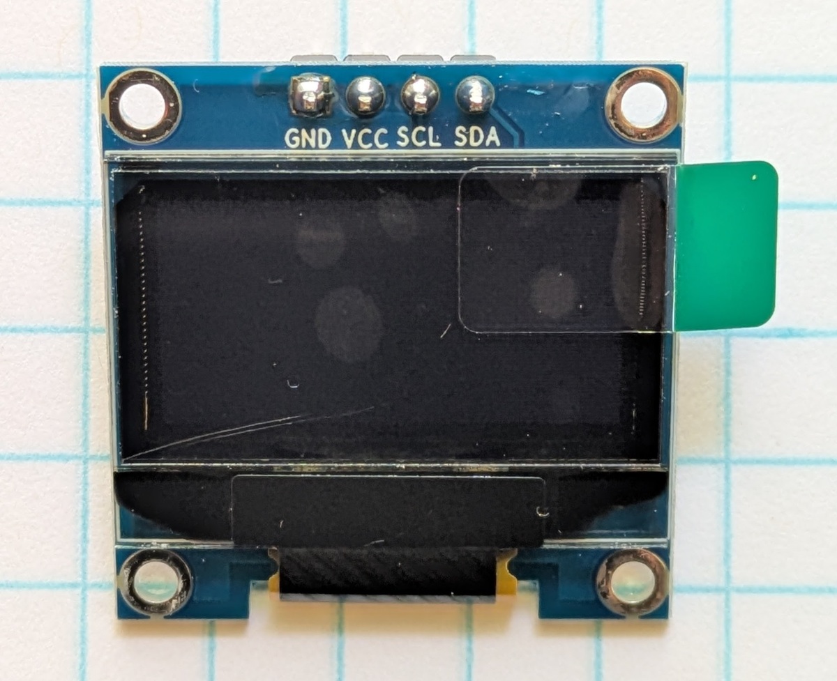 Image of the LED screen, not yet hooked up to anything.  Approximately an inch by an inch and a half.